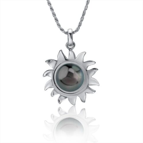 Silver sun-shaped pendant necklace with a reflective center.