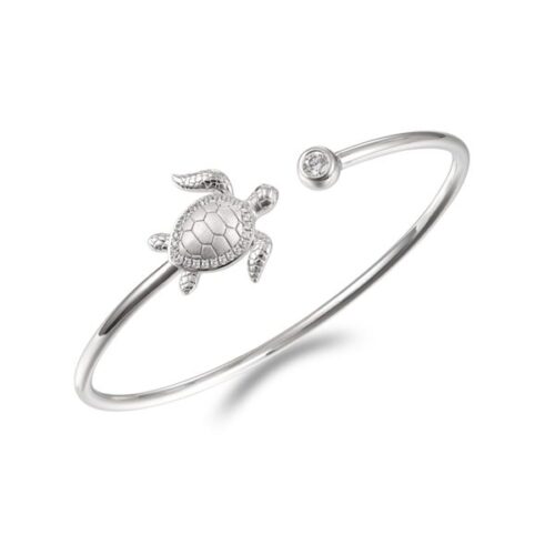 Silver open bangle bracelet with a turtle charm.